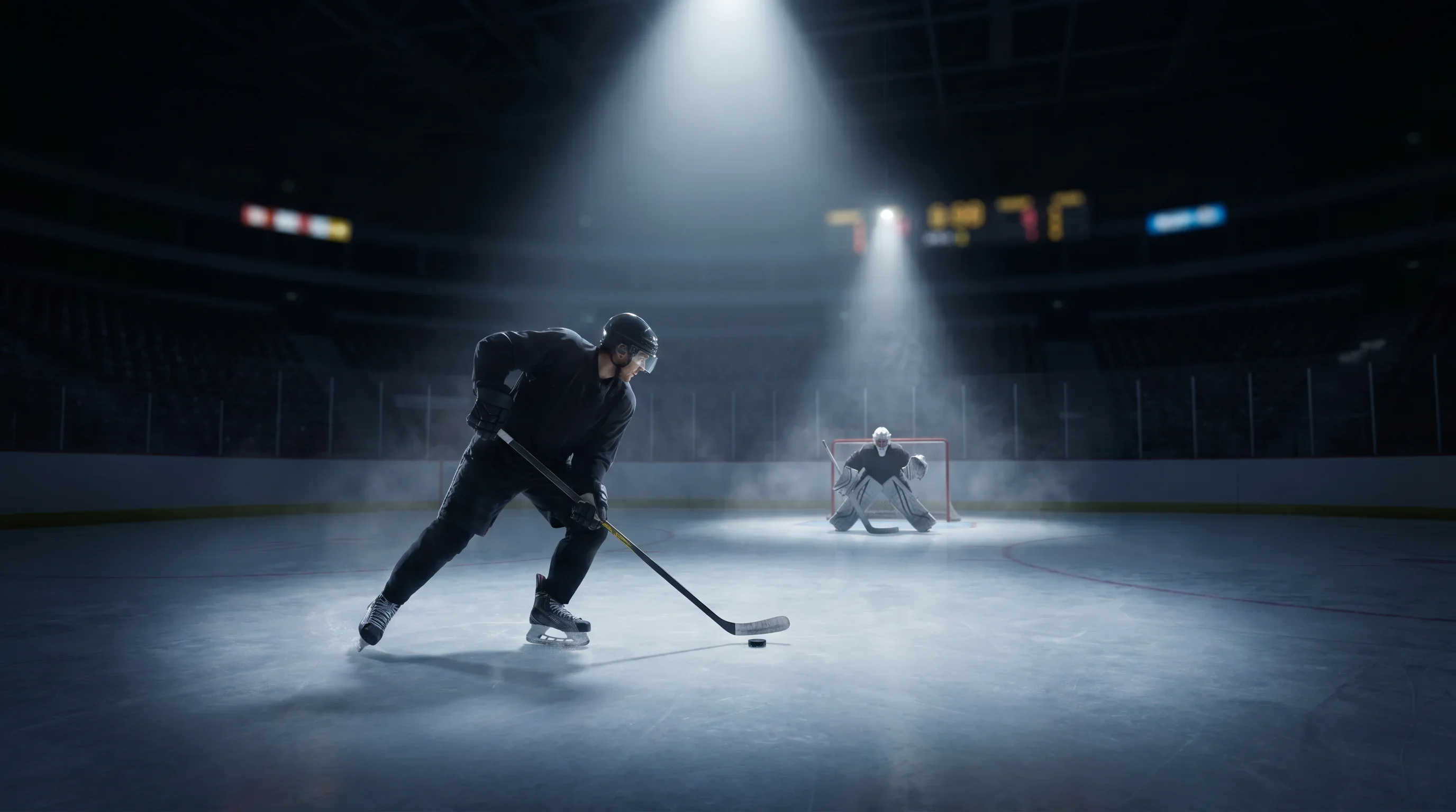 Ice hockey player skating alone toward goaltender during penalty shootout