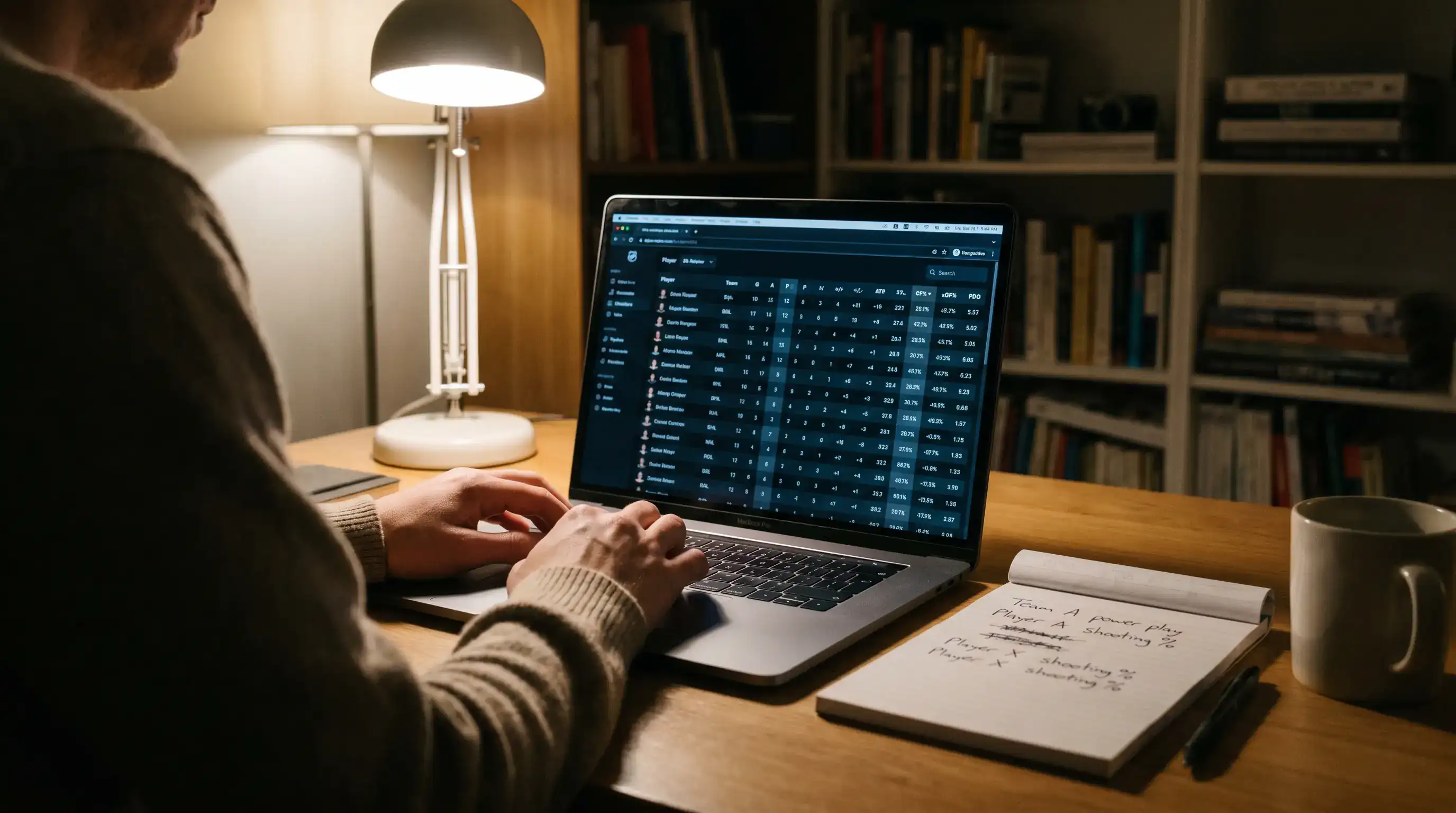 Hockey analyst reviewing NHL underdog win rate statistics on a laptop screen