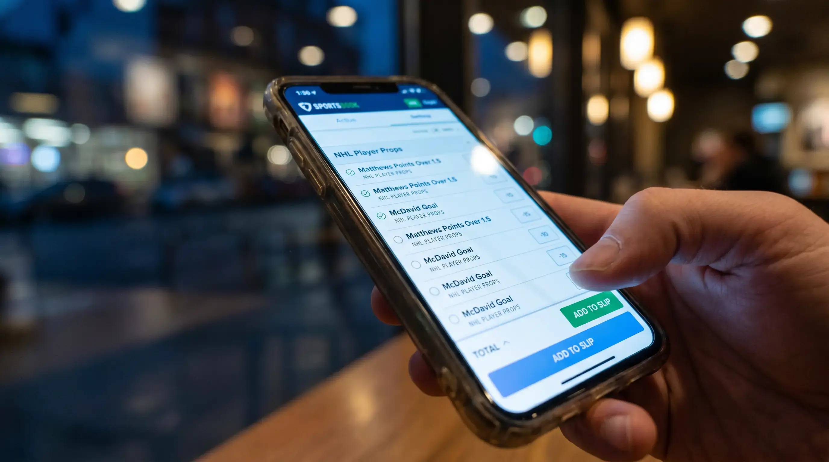 Mobile betting app showing NHL prop selections being added to a combined slip